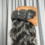 Close up of weft on wavy Raw Indian hair extensions